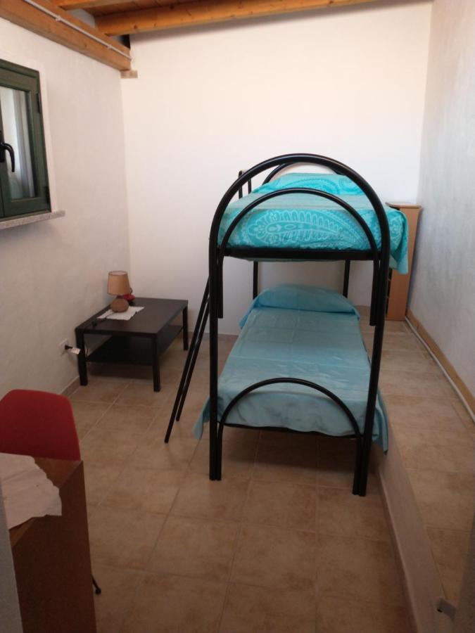 Da Carla Apartment Iglesias Bagian luar foto