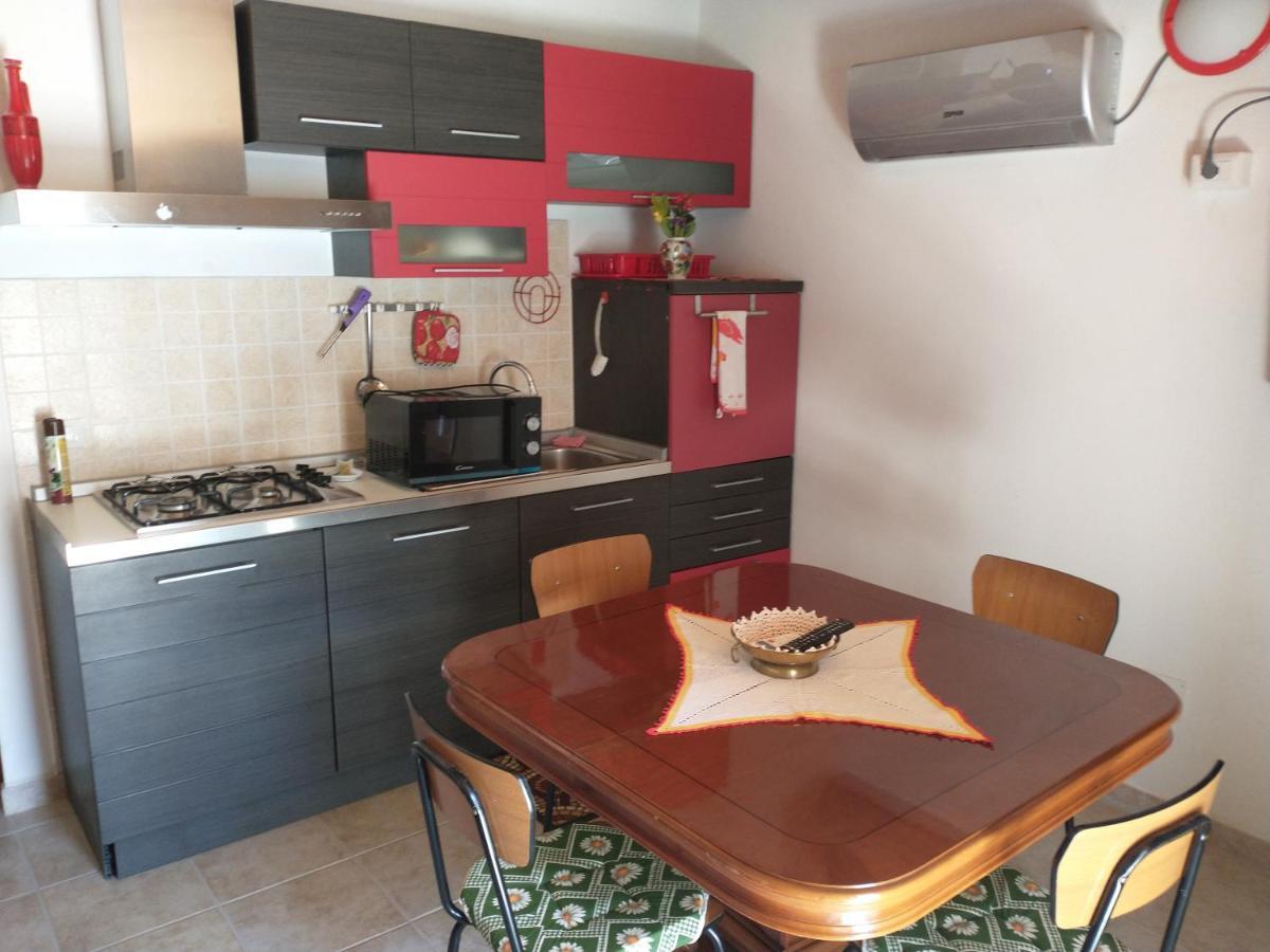 Da Carla Apartment Iglesias Bagian luar foto